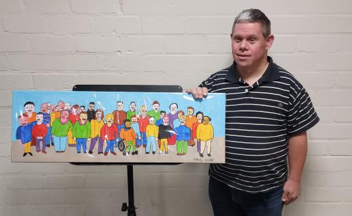 Medewerker Paul laat zijn eigen schilderij zien
