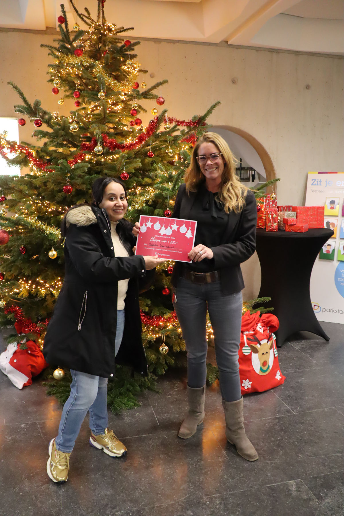 Stephanie met de winnaar CompetenSYS